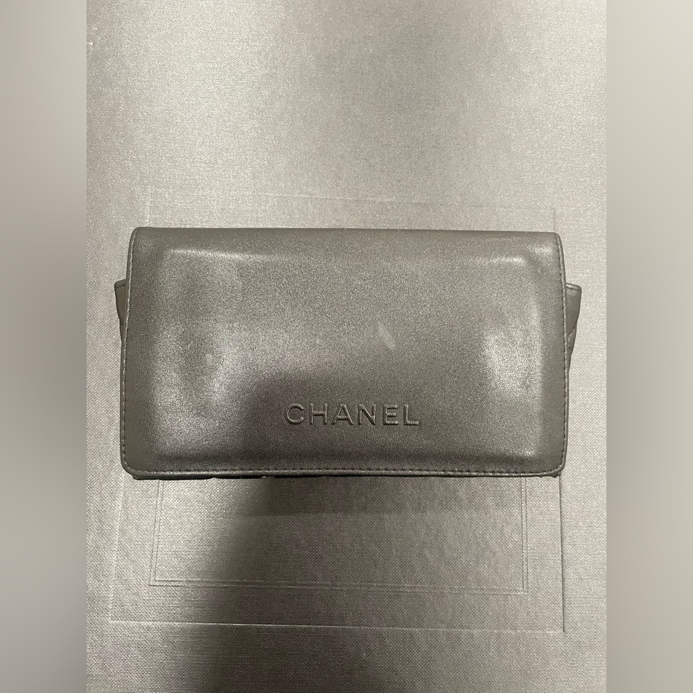 Genuine leather Chanel sunglasses case.
